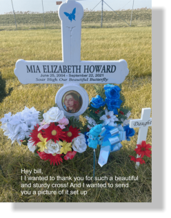 creative roadside cross with pictures